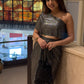 Metallic Pleated Skirt With Flared One Side Top