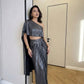 Metallic Pleated Skirt With Flared One Side Top